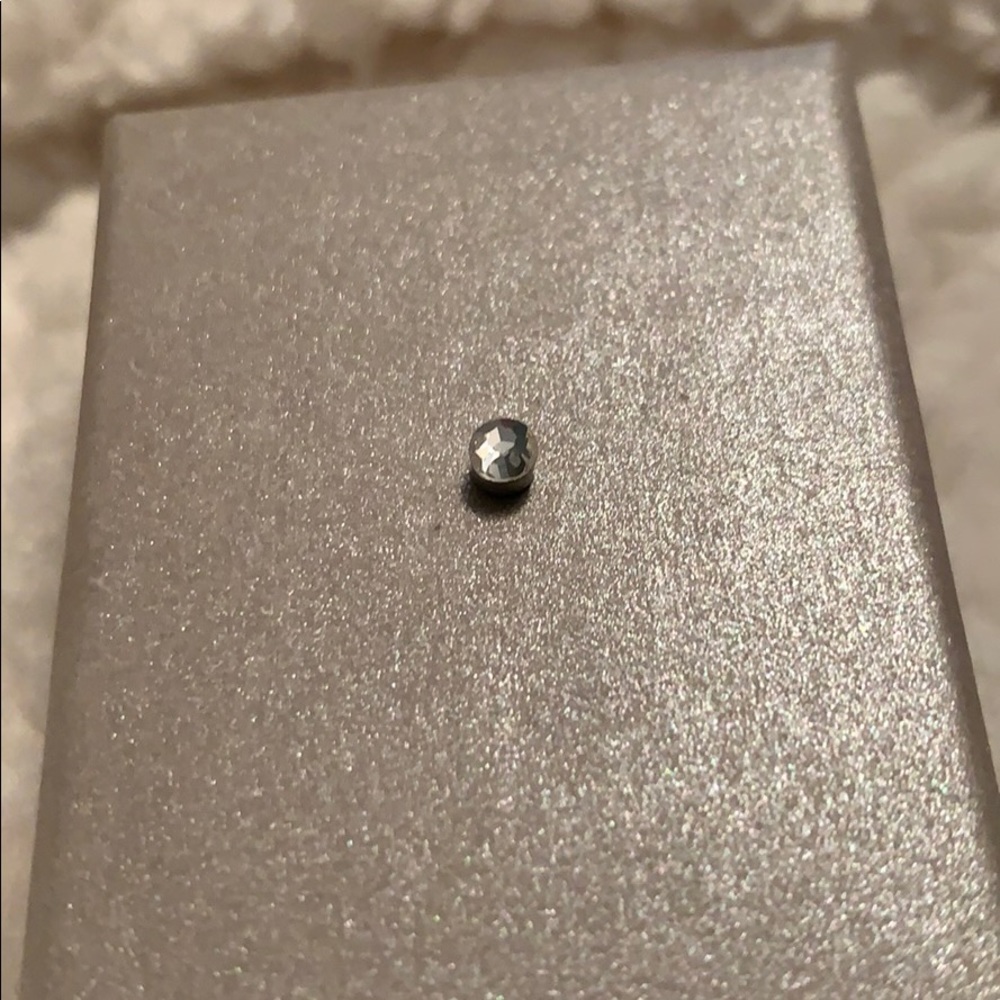 Magnetic faux piercings.